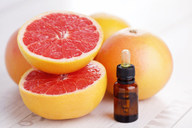 flaska grapefrukt eterisk olja - skönhetsbehandling