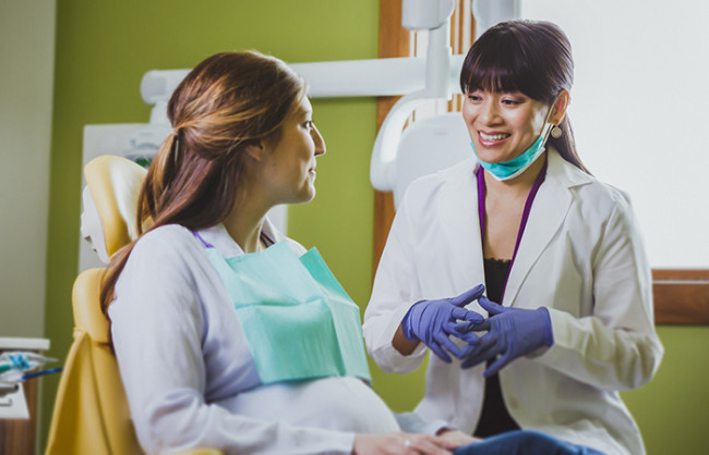 pregnant-AT-dentist-gloves