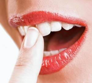 Ako posilniť úžasné zuby doma. Ako posilniť ďasien. Spôsoby, ako posilniť smaltovanie zubov